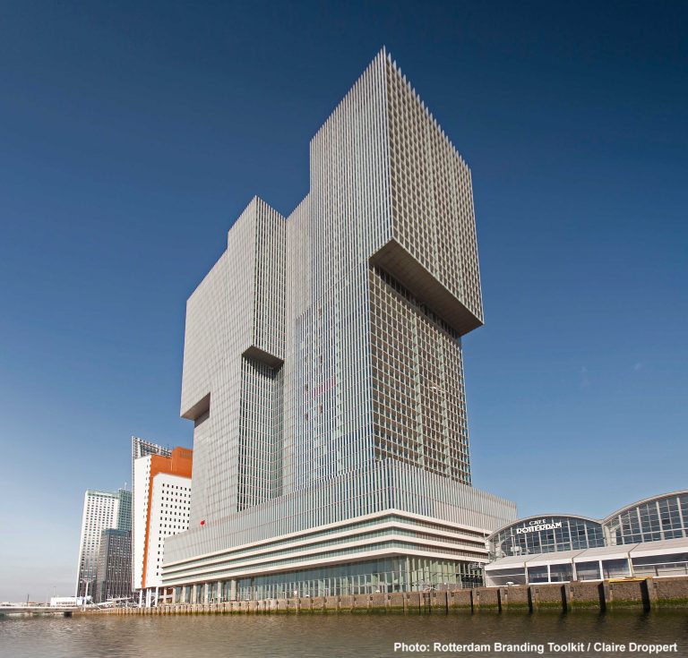 The building De Rotterdam is in area the largest in the Netherlands. The building on the right with the two arcs is the cruise terminal.