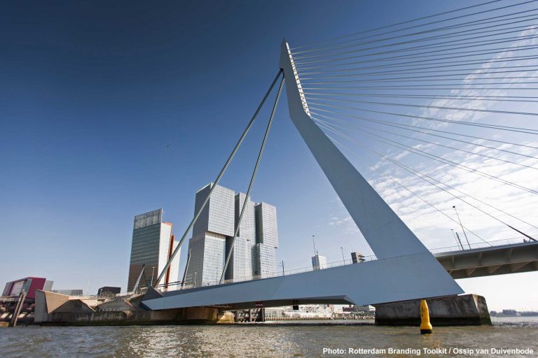The Erasmusbrug with on the background the building De Rotterdam on the Kop van Zuid.